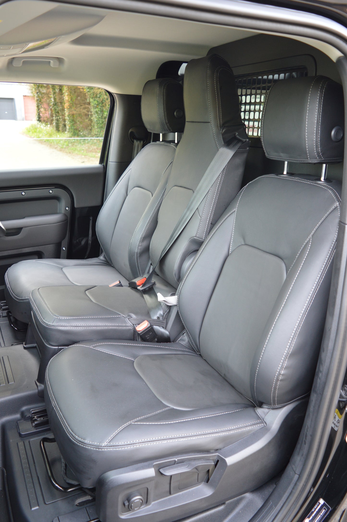 Land Rover Defender 2020+ Custom Front Seat Covers – Black Leatherette with DTS