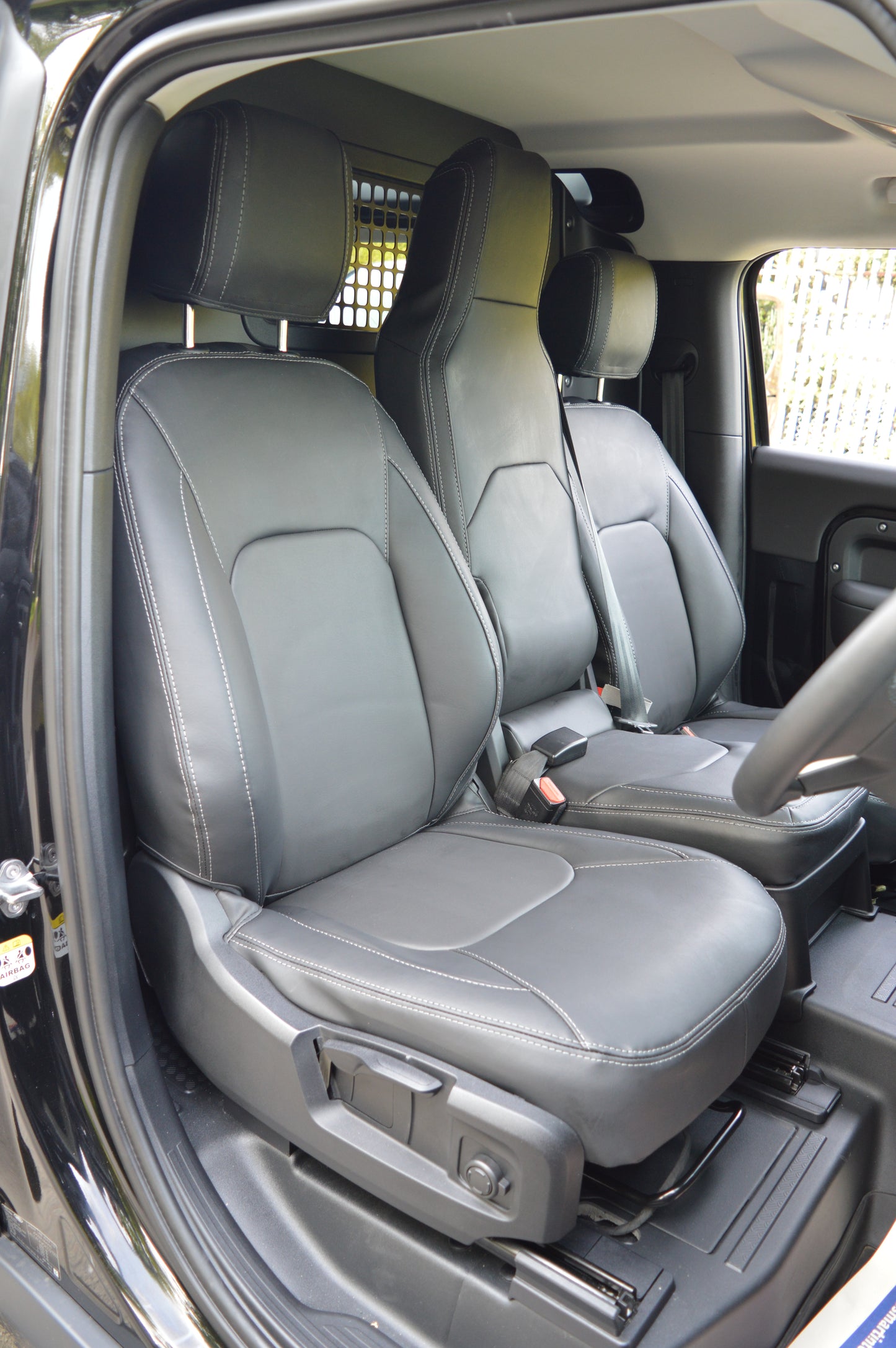 Land Rover Defender 2020+ Custom Front Seat Covers – Black Leatherette with DTS