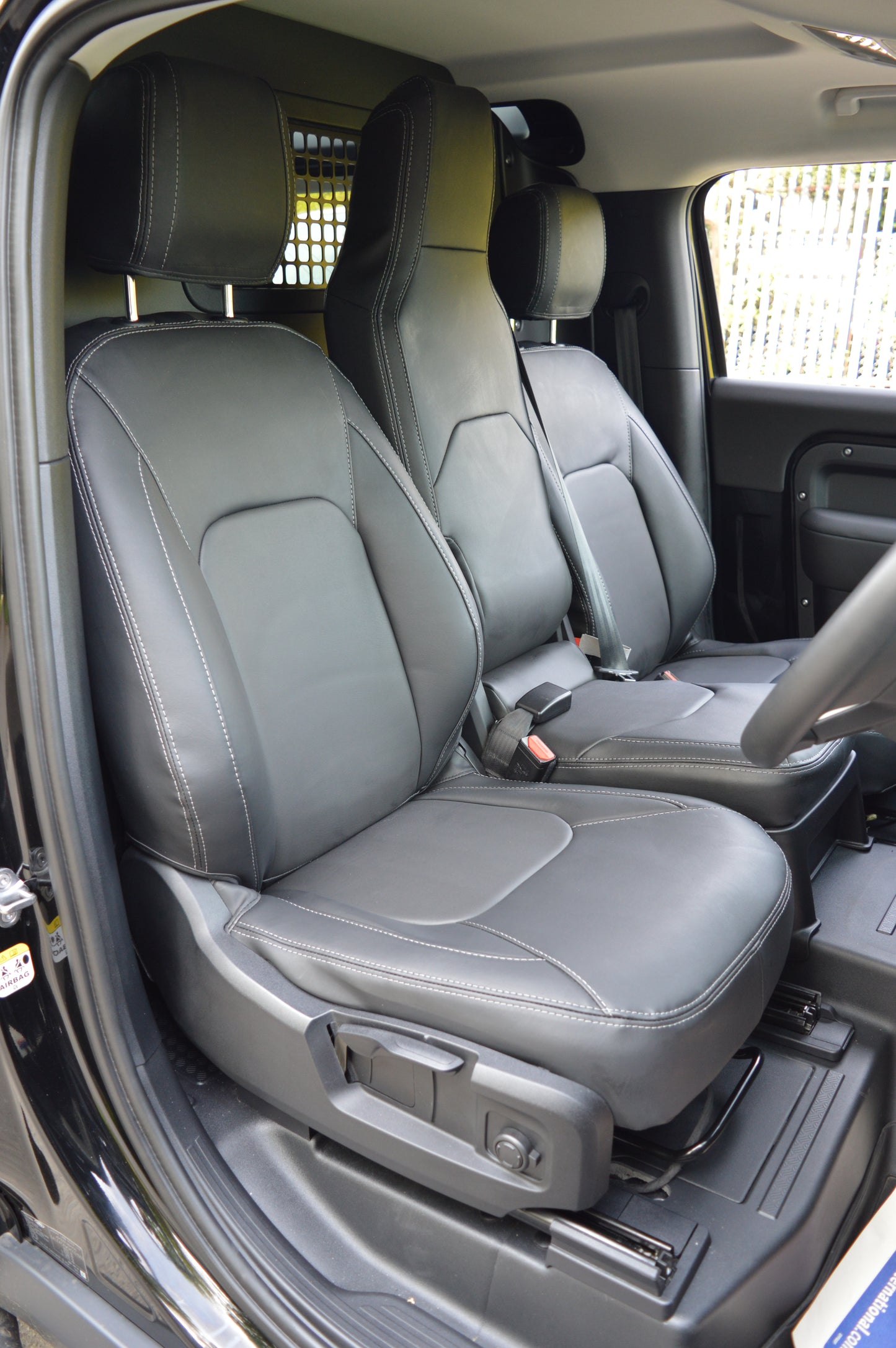 Land Rover Defender 2020+ Custom Front Seat Covers – Black Leatherette with DTS