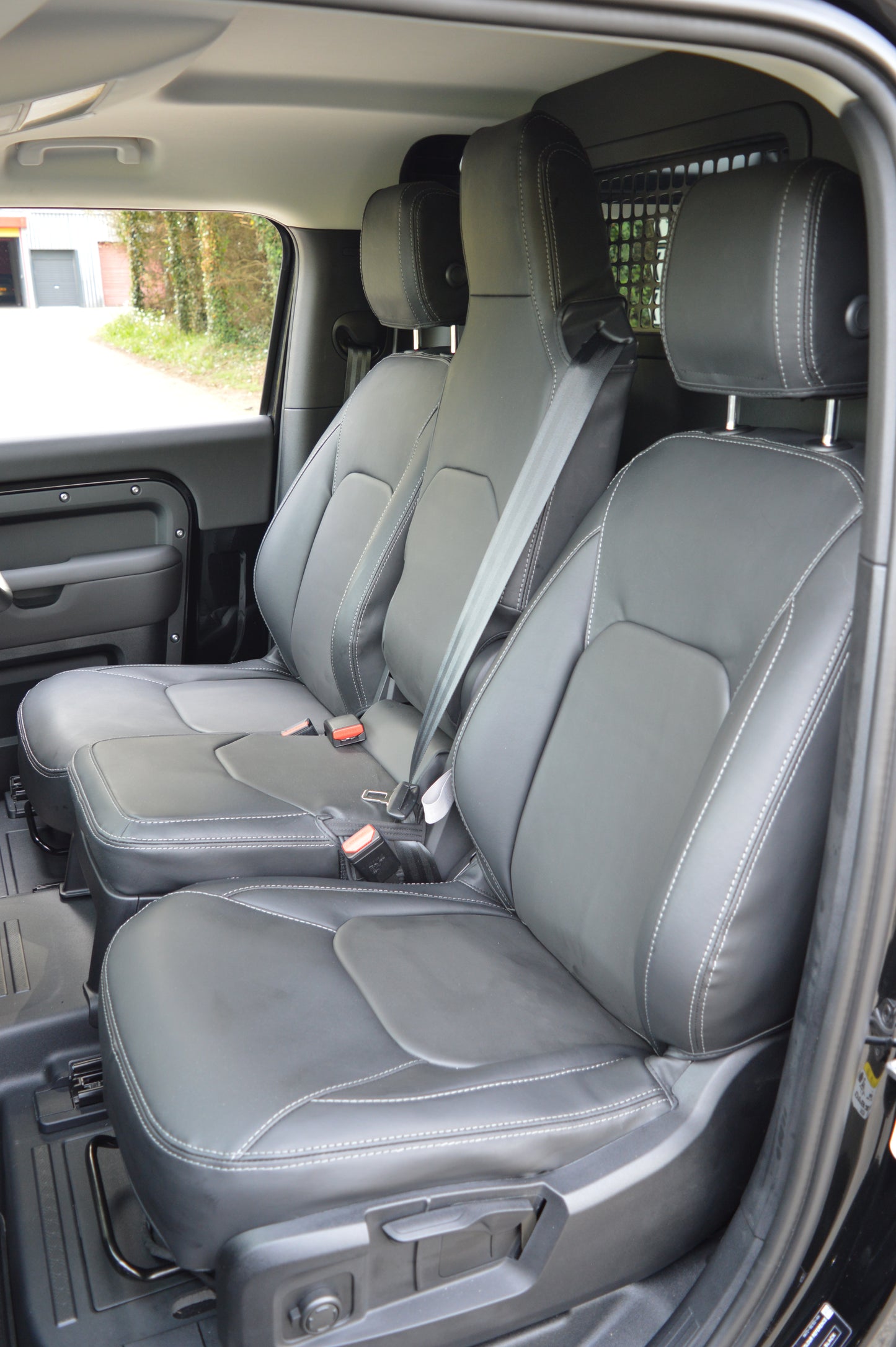Land Rover Defender 2020+ Custom Front Seat Covers – Black Leatherette with DTS